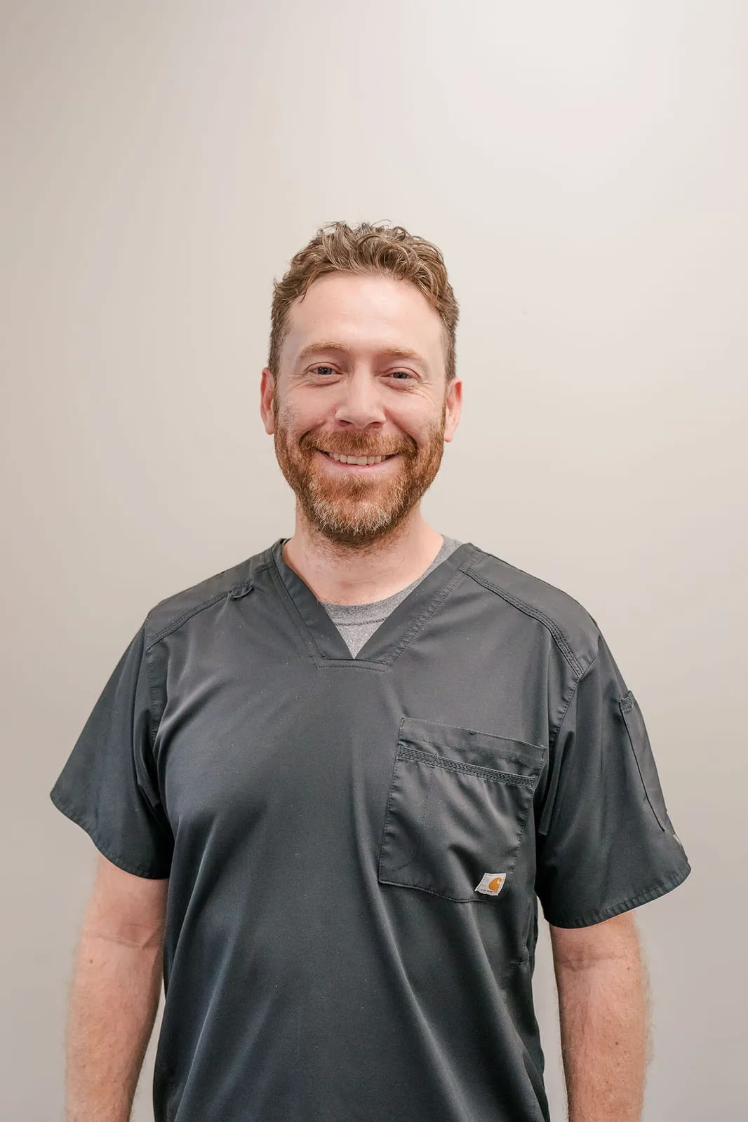 Full-length portrait of C. Christian Cueva, MD